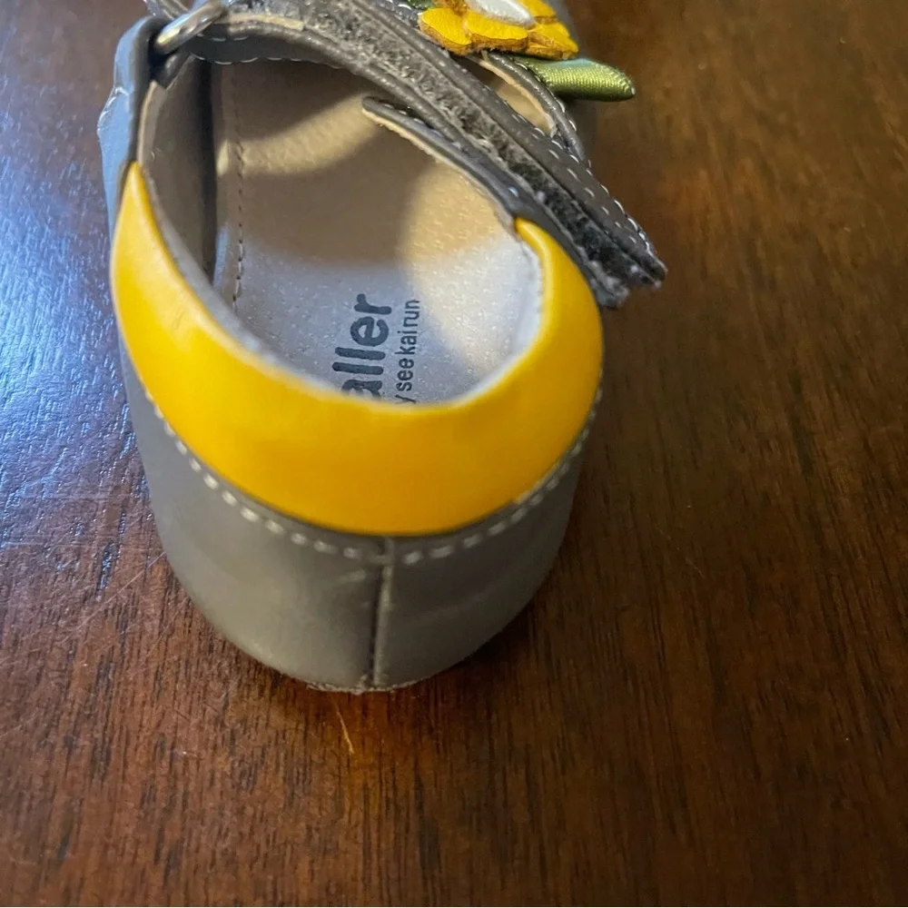 Gray Baby Shoes with Yellow Flower Accent